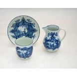 An 18th century Worcester blue and white sparrow beak creamer decorated with the 'Woman, child and