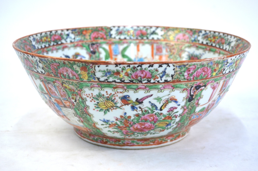 A large Canton famille rose punch bowl, decorated with typical panels depicting Natural History - Image 11 of 12