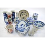 A quantity of Asian ceramics, comprising: two blue and white boxes of cylindrical form; two prunus