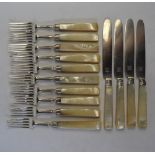 A George IV silver part-set of six dessert forks with four matching knives, with mother-of-pearl
