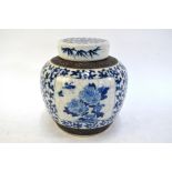 A large underglaze blue decorated Chinese vase with cylindrical cover; decorated with a Scholar