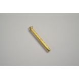 A 9ct yellow gold propelling toothpick, 5 cm long, approx 6g