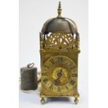 An early English brass lantern clock, the counterwheel bell striking movement with in-frame