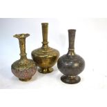 Three Indo-Persian, or other Asian, metalwork vases, including one decorated with scrolling