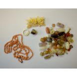 A quantity of loose multi-shaped and coloured beads including chalcedony, polished quartz and