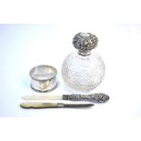 A Victorian hob-nail cut glass globular scent bottle with embossed silver bun cover, Chester 1904,