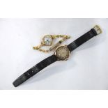 A gentleman's 9ct gold wristwatch with 15-jewel Swiss movement, silvered dial with subsidiary