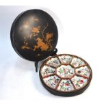 A nine piece Japanese porcelain set for Hors D'oeuvres or Kaiseki-ryori; each piece decorated with a