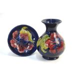 A Moorcroft Clematis pattern ovoid vase, 13 cm high to/w a matching bowl, 11 cm diam., both with