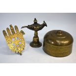 A Brass Hamsa or Hand of The Lady Fatima, 20.5 cm high; together with an Indian or Nepalese votive