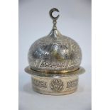 An Islamic incense burner, or other vessel, with a pierced domed cover designed as a Mosque; the