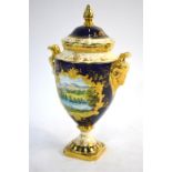 A Coalport twin handle vase and cover decorated with a painted reserve of 'Langdale Pikes' by Norman