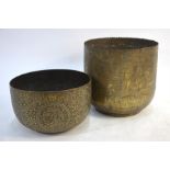 Two Indian, or other Asian, base metal bowls; one decorated with figures beside foliage, 20 cm high;