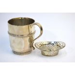 A heavy quality silver Christening mug with scroll handle and moulded foot rim, Mappin & Webb,