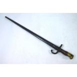 A 19th century French epee/gras bayonet, St. Etienne 1877, 52 cm blade, brass and wood hilt, steel