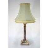 A plated on copper classical column table lamp on square base, 36 cm high