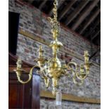 A good quality heavy brass five branch electrolier with pineapple finial, 58 cm diameter