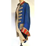 A French 18th century style military jacket with metallic braiding and white metal buttons and a