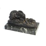 AMENDED DESCRIPTION After L. Reeves - a brown patinated bronzed mother rabbit with babies, eating