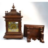 A 19th century oak German carved oak bracket clock by Winterhalder and Hofmeier, eight-day movement,