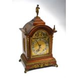 A continental architectural form oak eight-day two train table clock, circa 1910, the Winterhalder &