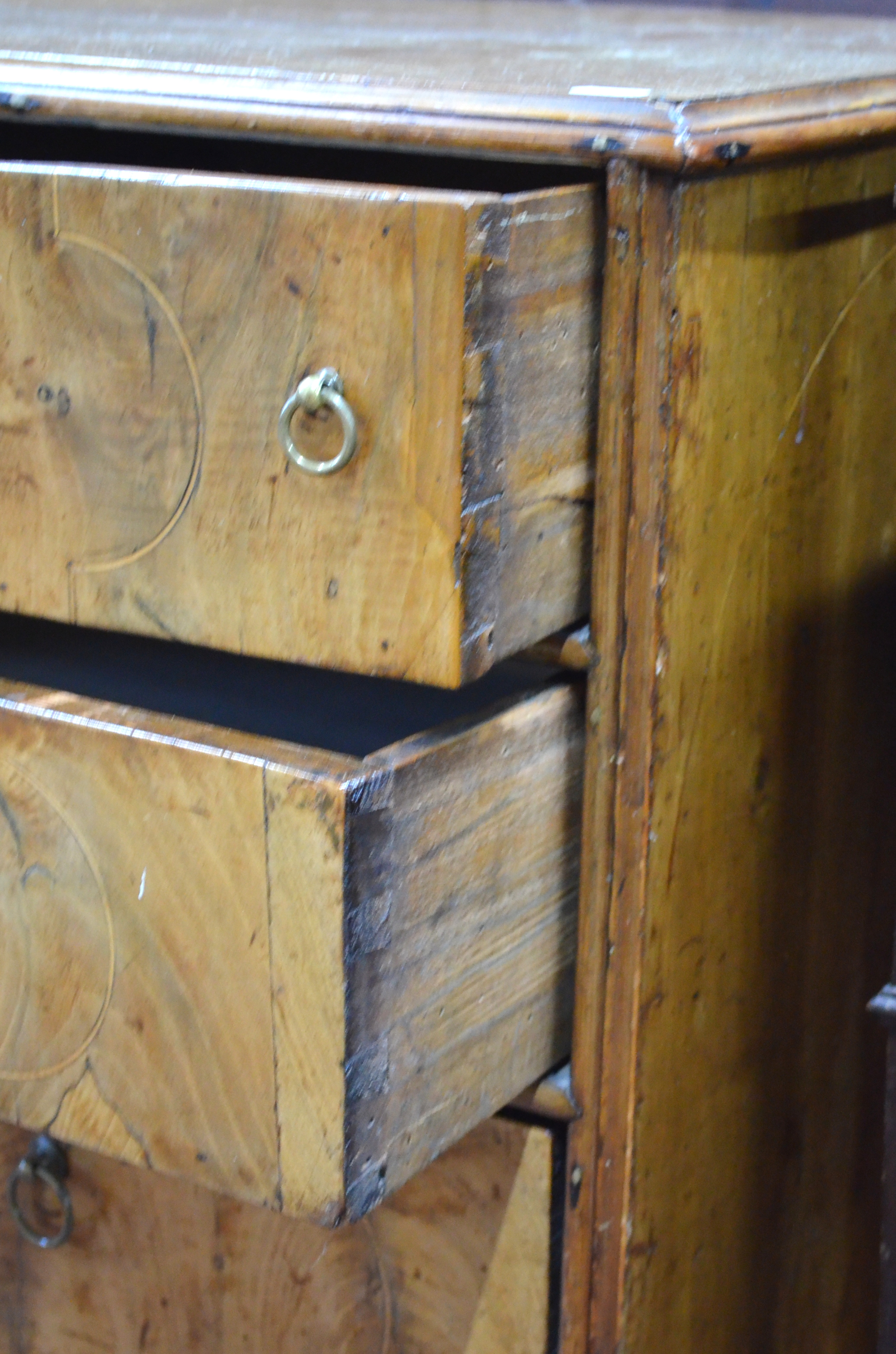 A late 17th century walnut chest of two short over three long graduated drawers, with brass ring - Image 7 of 8