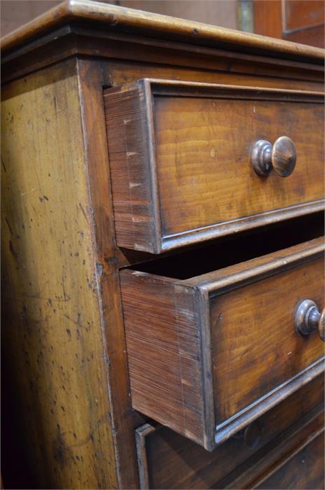 A Victorian mahogany cabinet over five long even drawers with turned wood pulls, on a plinth base, - Image 2 of 3