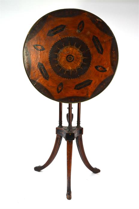 A George III inlaid satinwood tilt top wine table, the circular top centred by a batwing design