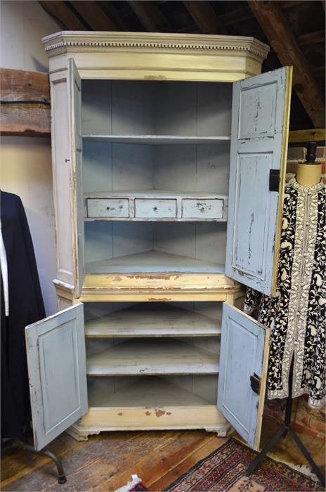 An antique painted pine cream two part standing corner cupboard, with two pairs of panelled doors - Image 2 of 2