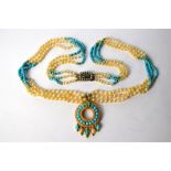 A pearl and turquoise necklace, three strands knotted throughout onto Victorian seed pearl and