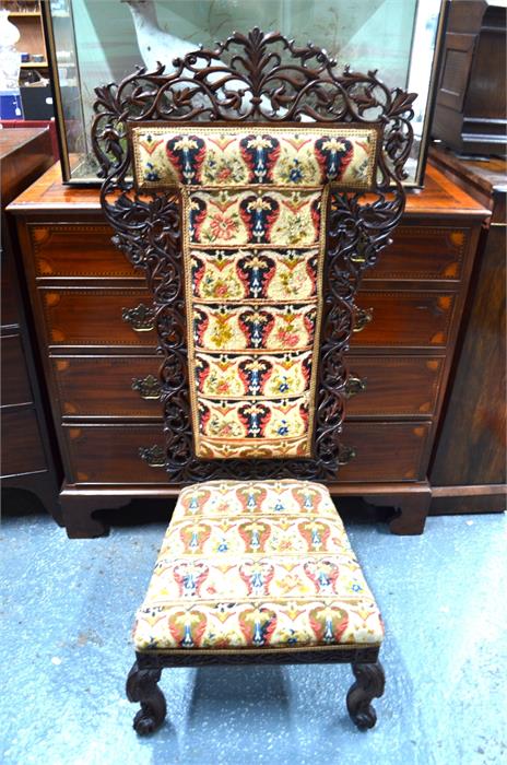 An unusual Victorian pre dieu chair (prayer chair) the all-round pierced and carved frame with