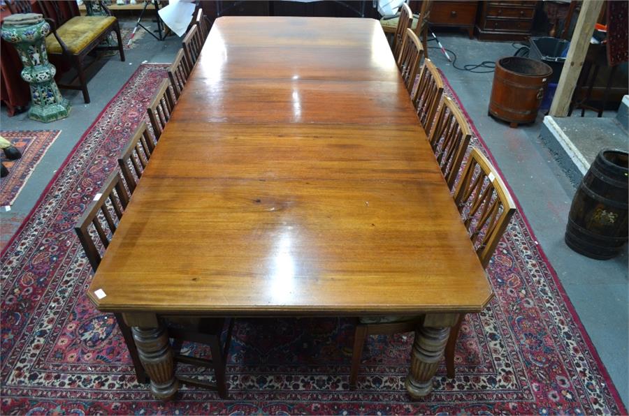 A late 19th century mahogany extending dining table, the rectangular top with moulded edges and - Image 2 of 8