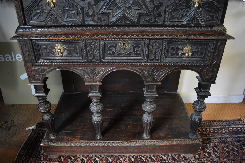 An antique carved oak chest on stand in the 17th century style, having four long irregular drawers - Image 5 of 14