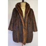 REVISED ESTIMATE - A dark brown/russet shadowed mink jacket with brown satin lining and inner