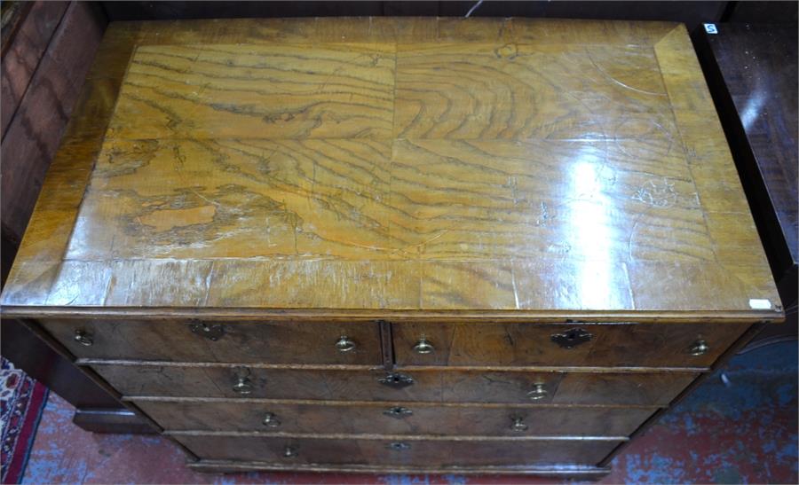 A late 17th century walnut chest of two short over three long graduated drawers, with brass ring - Image 3 of 8