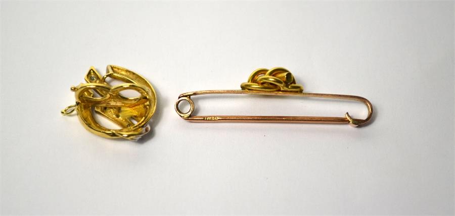 A yellow metal scroll brooch set with two rows of diamonds stamped 9ct and 385 to/w a 9ct yellow - Image 2 of 2