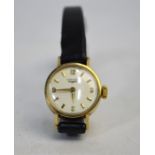 A lady's 9ct gold Longines wristwatch on leather strap