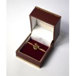 A Victorian gold bar brooch with u-shaped diamond-set harp on knife-edge unmarked bar, 4 cm long,