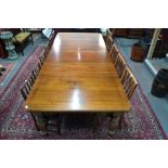 A late 19th century mahogany extending dining table, the rectangular top with moulded edges and