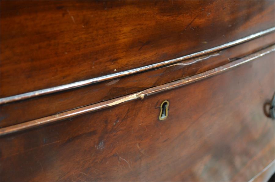 A 19th century bow front mahogany chest with brush slide over three long graduated drawers, raised - Image 3 of 3