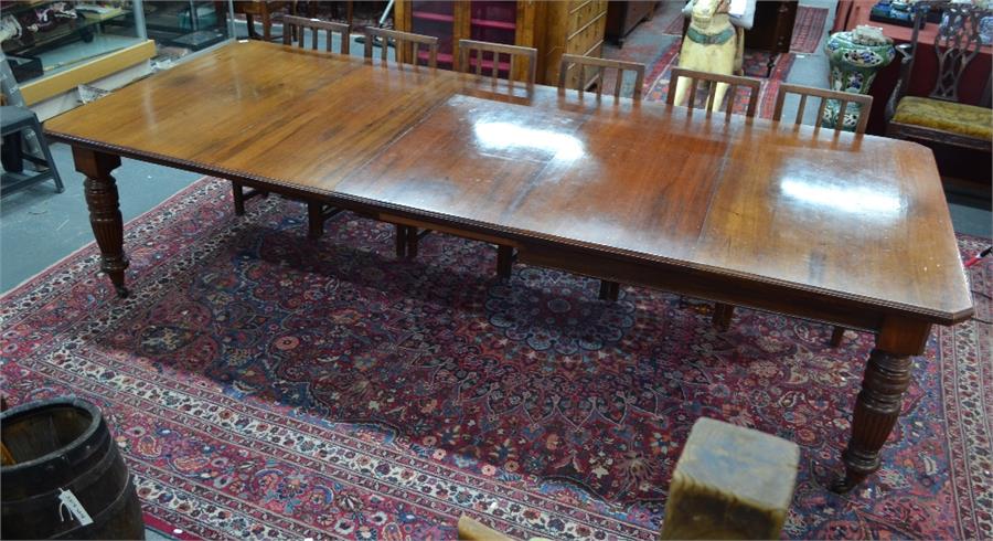 A late 19th century mahogany extending dining table, the rectangular top with moulded edges and - Image 3 of 8