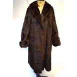 A dark brown French squirrel fur coat and a pony fur coat with mink collar (label for Marshall &