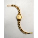 A lady's 9ct gold Longines wristwatch with automatic movement, on gatelink bracelet strap, 23 g