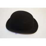 A Bowler Hat; the interior band printed 'Hawkes & Co. Ltd./1 Savile Row, W. and Camberley/Lincoln