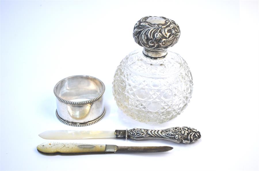A Victorian hob-nail cut glass globular scent bottle with embossed silver bun cover, Chester 1904,