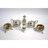 A pair of George III silver open salts with floral chased decoration and hoof feet (marks rubbed),