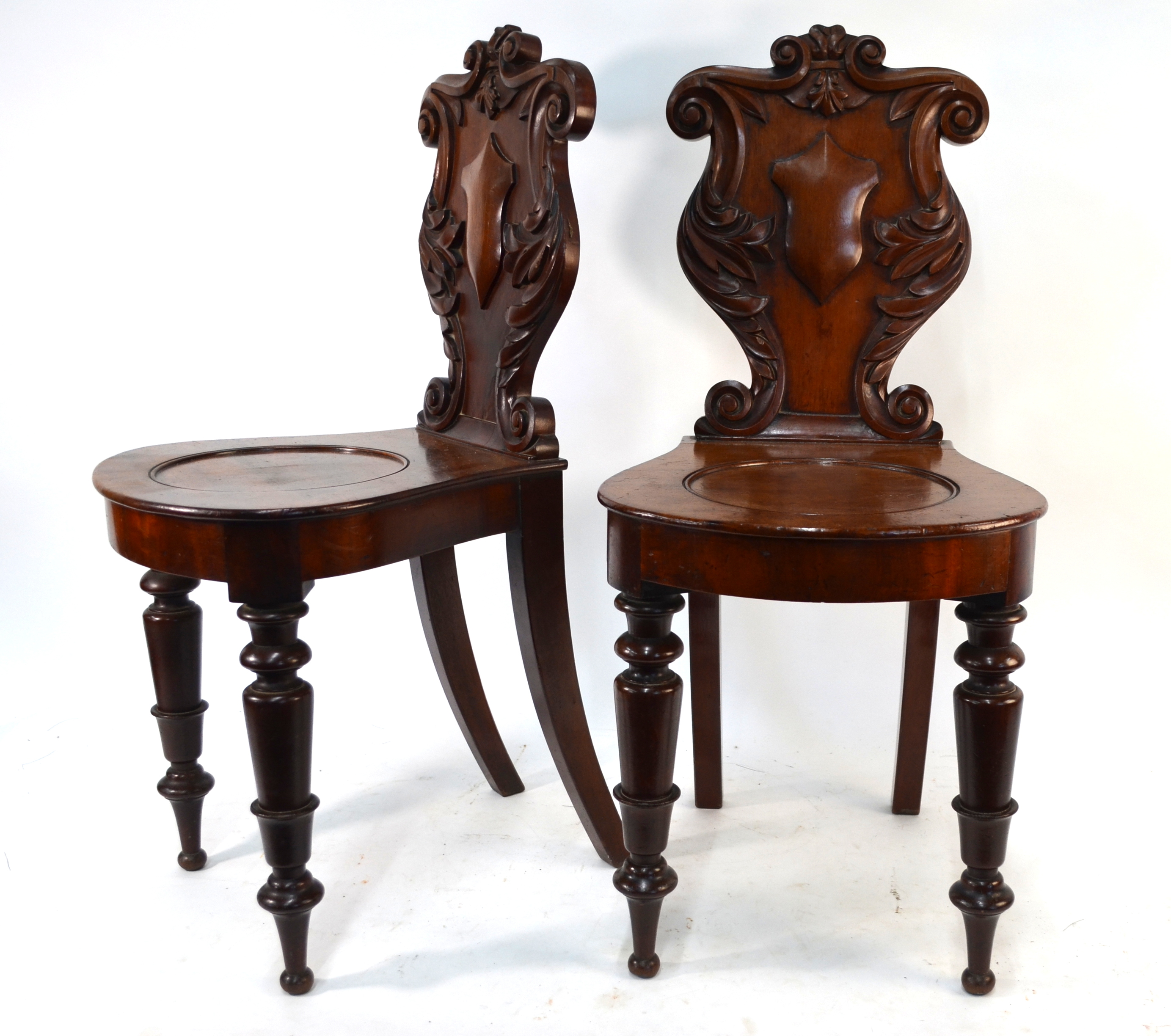 A pair of William IV mahogany moulded shield back hall chairs (2)No castors No evidence of worm,