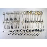 A complete set of George IV OEP flatware, comprising twelve each table spoons and forks, dessert