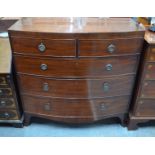 A 19th century mahogany bowfront chest of two short over three long graduated drawers on splayed