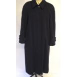 A lady's Selfridges 100 per cent cashmere navy blue full length coat lined with blue self-striped